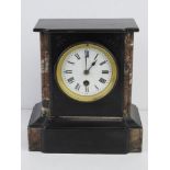 A slate and marble architectural mantel clock, 21cm wide.