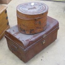 A Victorian tin lidded trunk together with a tin lidded hat box. Trunk 59cm, hat box 36cm.