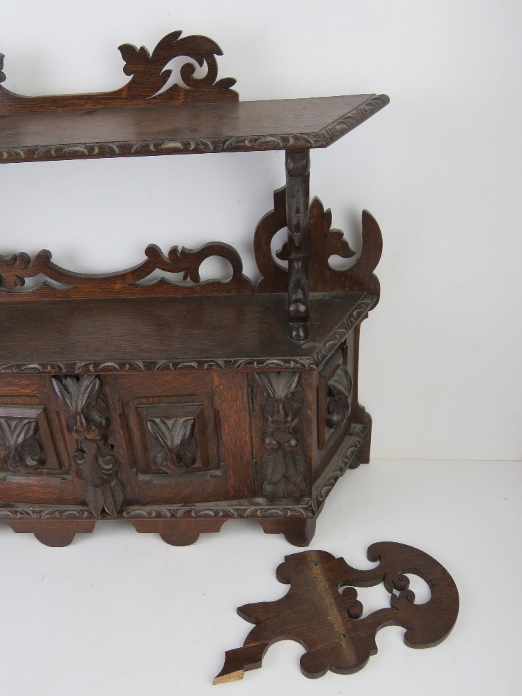A 19thC carved oak wall hanging smoker's type cabinet. - Image 2 of 4