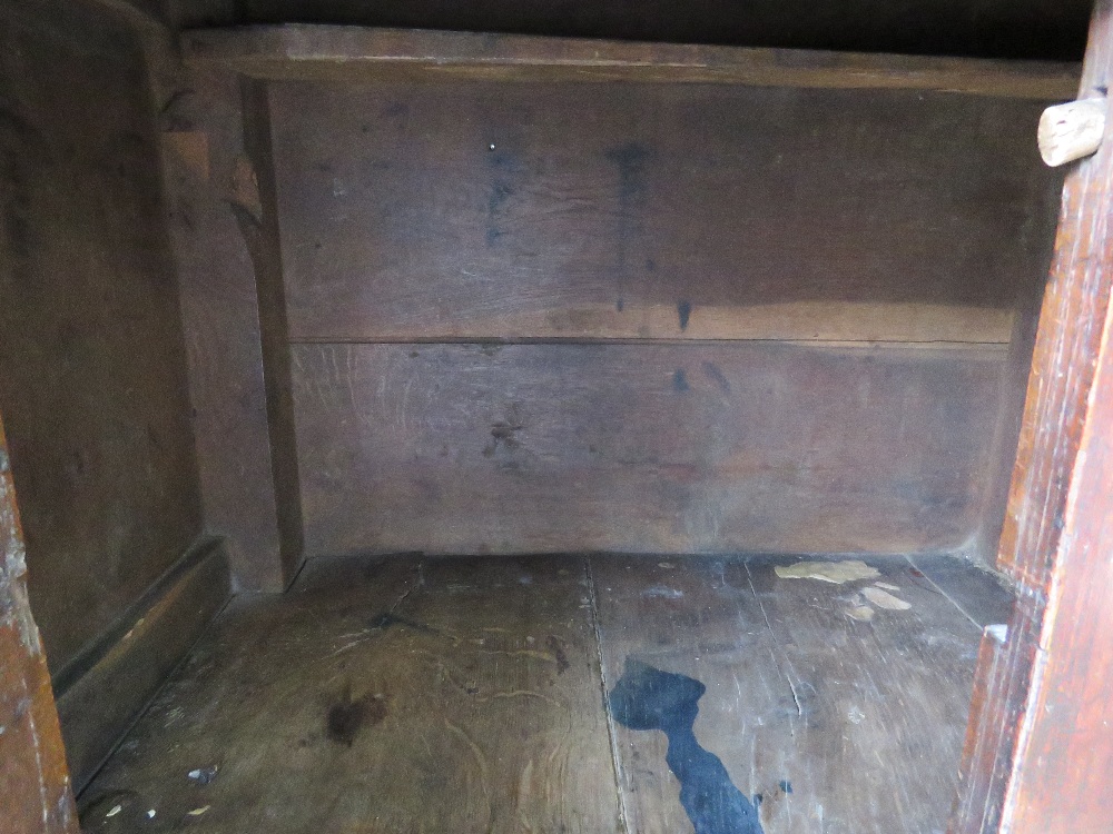 An 18th century oak court style cupboard having central field moulded panel to middle section and - Image 8 of 9