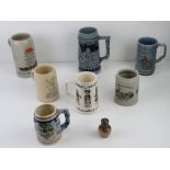 A quantity of tankards including an Irish made blue and green glazed tankard having hunting scene