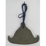 A heavy hand cast hanging Oriental style censor hanging hook.