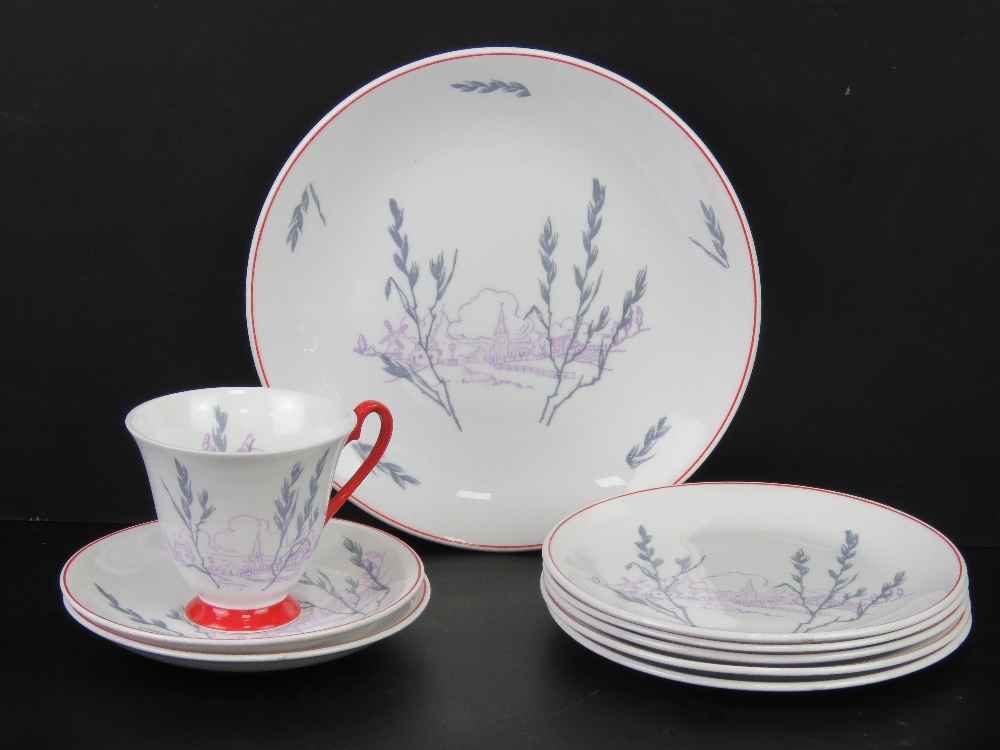 A Windsor bone chine 'village vista' pattern trio (cup, saucer,