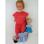 A vintage Walkie Talkie doll standing 67cm high. Together with a Rosebud doll. Two items.