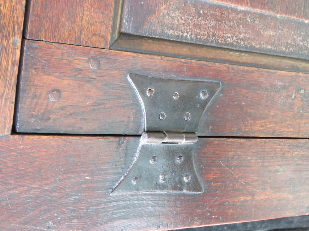 An 18th century oak court style cupboard having central field moulded panel to middle section and - Image 5 of 9