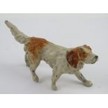A hand painted cast aluminium figure of an English Setter measuring 11cm in length.