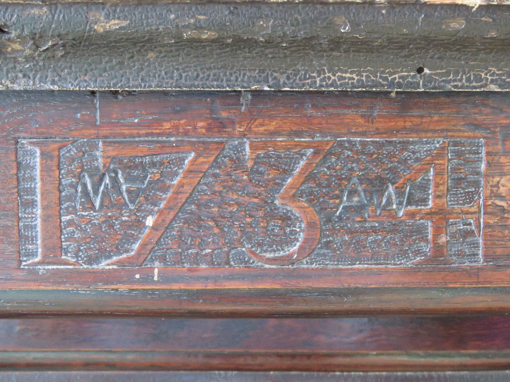 An 18th century oak court style cupboard having central field moulded panel to middle section and - Image 2 of 9