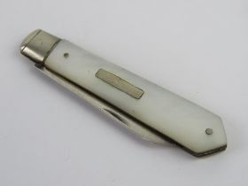 A William Needham silver and mother of pearl fruit knife, sheffield 1921 hallmark.