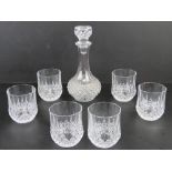 A set of six Whiskey tumblers together with matching decanter.