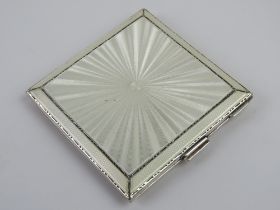 A Henry Clifford Davis of Birmingham 1949 enamel and silver Art Deco compact.