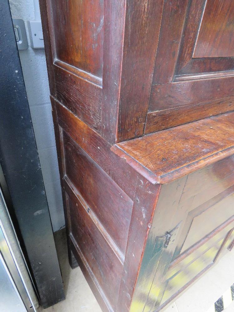 An 18th century oak court style cupboard having central field moulded panel to middle section and - Image 6 of 9