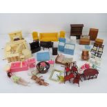 A quantity of vintage mid century wooden and other dolls house furniture including Dol-Toi items.