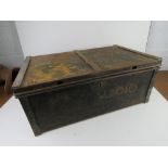 A WWII metal military trunk having plate dated 1940 with broad arrow to inside of lid,