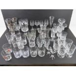 A large quantity of assorted glassware including a pair of pink and green lemonade goblets,