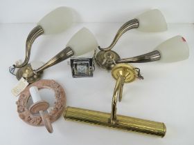 A quantity of wall light fittings including brass downlighting fitting.