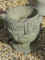 A pre-cast Greek key Bacchus style urn planter, 27cm high, 23cm wide.