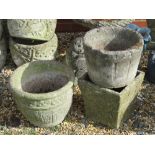 Three pre-cast stone garden planters, 19 - 26cm high.