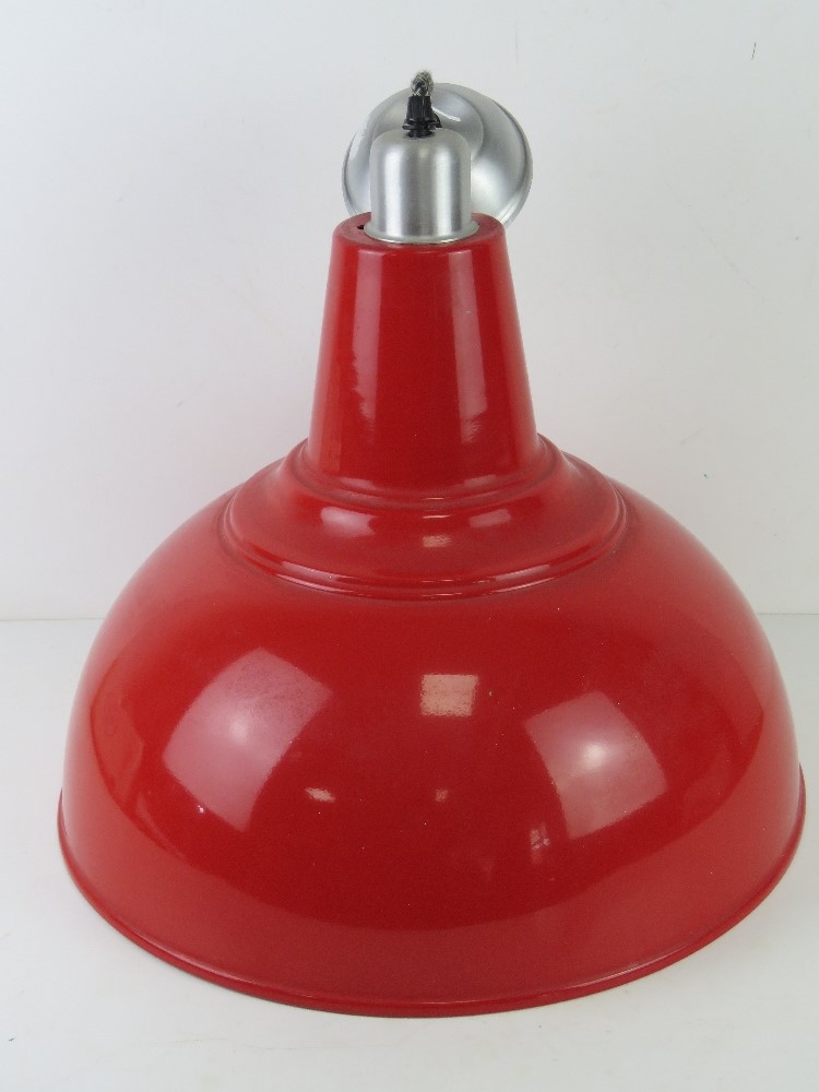 A large contemporary red painted industrial style lamp shade, 41.5cm dia.