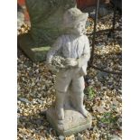 A 'Little Boy Blue' garden statue, 45cm high.