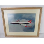 Photographic print; Royal Aircraft Establishment aircraft in flight, sight size 39 x 27.