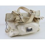 A handbag by Robert Pietri in cream appr