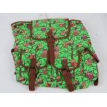 An owl pattern neon green ruck sack 'as