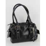 A small black handbag by Debenhams havin