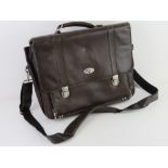 A brown leather satchel/laptop bag by An