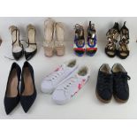 A quantity of assorted shoes inc platfor