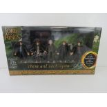 A Lord of the Rings figurine set in original box,