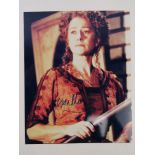 A hand signed photograph of Dame Helen Mirren DBE, autograph in blue pen.