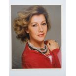 A hand signed photograph of Dame Helen Mirren DBE, autograph in gold pen.