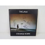 The Jam; autographed 'Strange Town' vinyl single, hand signed to the front by Paul Weller,