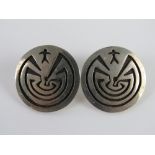 A pair of Native American sterling silver earrings having designer mark Puhuhoiya, 2.7cm dia.