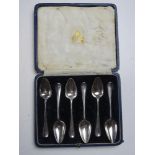 A boxed set of HM silver fruit spoons. Total weight 136g.