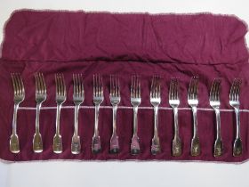 To match above lot; A set of twelve HM silver dinner forks in roll,