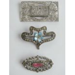 Three vintage silver brooches; a 930 silver continental enamelled brooch,
