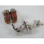 Two pairs of contemporary cuff links, one in the form of Cuban cigars,