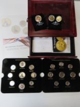 The London Mint 'Farewell to some of our National Symbols' coin collection in display case.