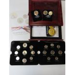 The London Mint 'Farewell to some of our National Symbols' coin collection in display case.