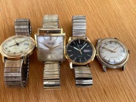 A selection of four contemporary sprung-strap gold-plated watches; 17 jewel Corvette, Timex,