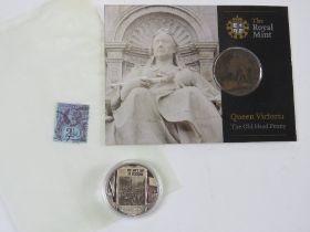 A Royal Mint Queen Victorian Old Head Penny in packaging,