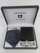A Geneva Sports stainless steel wristwatch gift set in box with tie,