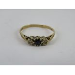 A 9ct gold sapphire and diamond ring, hallmarked 375, size M-N, 1.1g.
