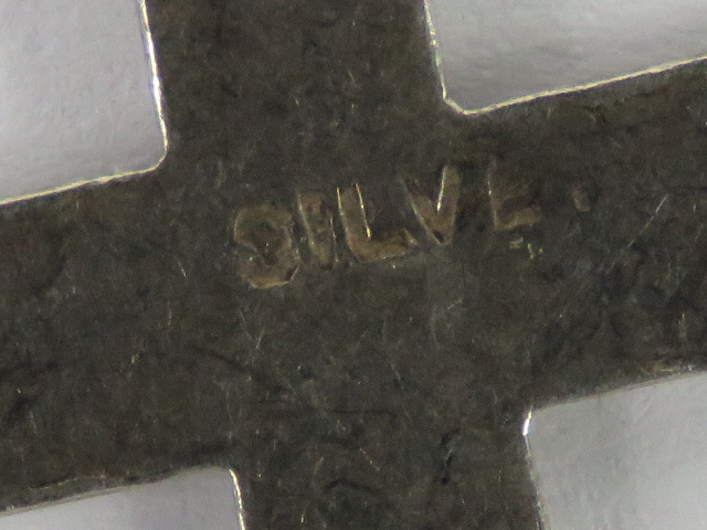 A silver crucifix pendant having scrolling engraving to front, stamped silver, 3. - Image 2 of 3