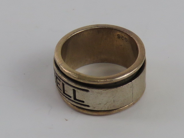 A silver ring by Paul Mitchell having slightly worn marks within, stamped 925, size R-S. - Image 3 of 4