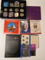 A collection of commemorative coins including Queen Elizabeth II 80th BIrthday crown, 1985, 2006,