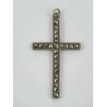 A silver and marcasite cross or crucifix pendant, stamped Sterling to back, measuring 4.