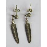 A pair of Native American feather pattern earrings, no apparent marks, 3.3cm in length.