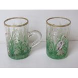 A pair of delightful hand painted glass tot cups,